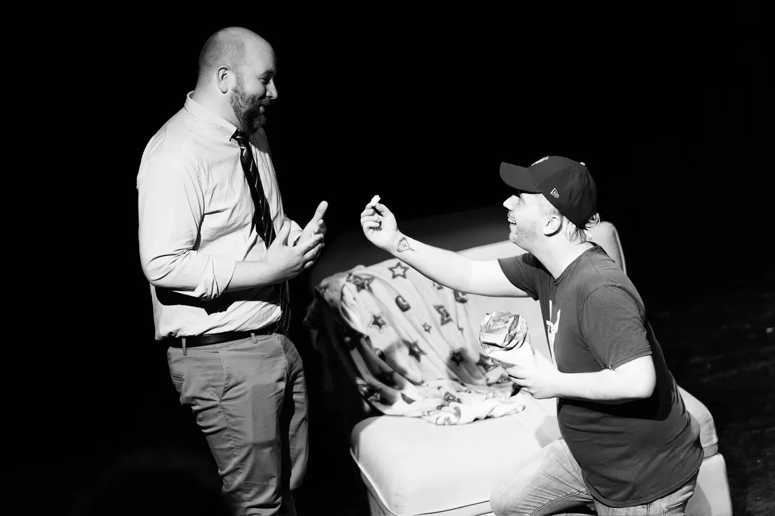 Kneeling with an offering, black and white