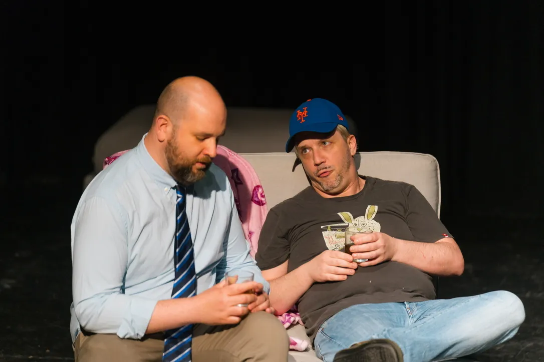 Comedy scene on a sofa